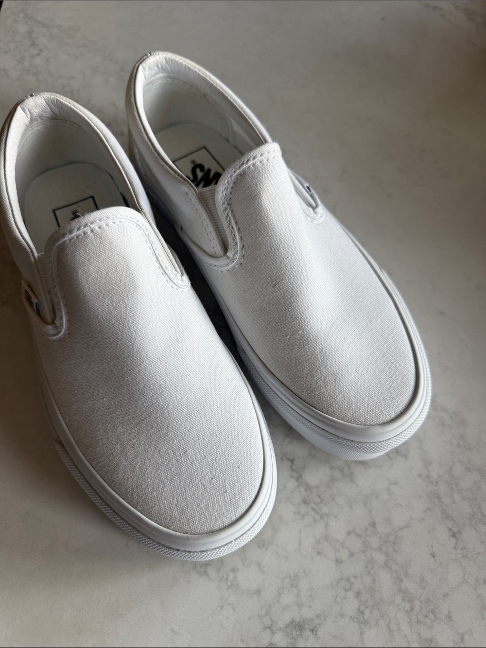 Vans White Classic Slip-On Canvas Sneakers